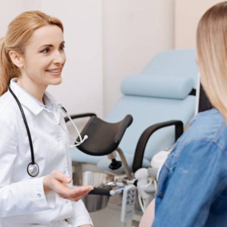 gynecologist speaking with a patient